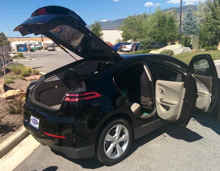 Bulletproof Chevy Volt in front of Armormax Utah facility