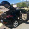 Bulletproof Chevy Volt in front of Armormax Utah facility